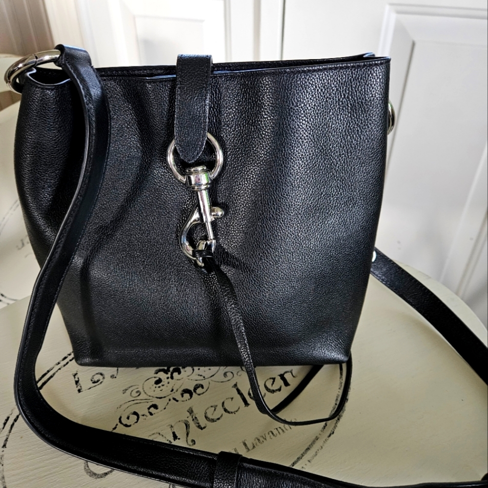 Rebecca Minkoff crossbody bag, 100% leather, magnetic snap closure.